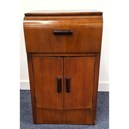 568 - PLUS-A-GRAM RECORD PLAYER
in mahogany veneered cabinet, the fall flap revealing record player above ... 