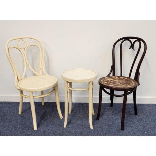 650 - TWO THONET STYLE BENTWOOD CHAIRS
one with O shaped back and painted in white, a matching table, the ... 