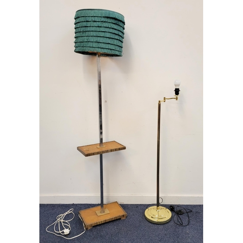 653 - TWO FLOOR STANDING LAMPS
one with chrome stand and central rectangular shelf, the other a brass colu... 