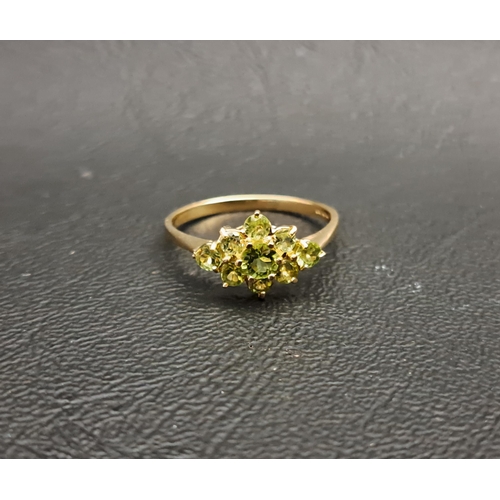 27 - PERIDOT CLUSTER RING
the gemstones in diamond shaped setting, on nine carat gold shank, ring size Q-... 