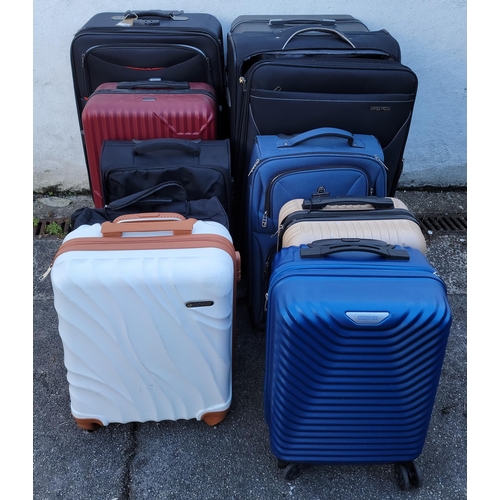 59 - TEN SUITCASES
including Swiss Polo, IT Luggage, Princess Traveller, and Atlantic
Note: Note: Suitcas... 