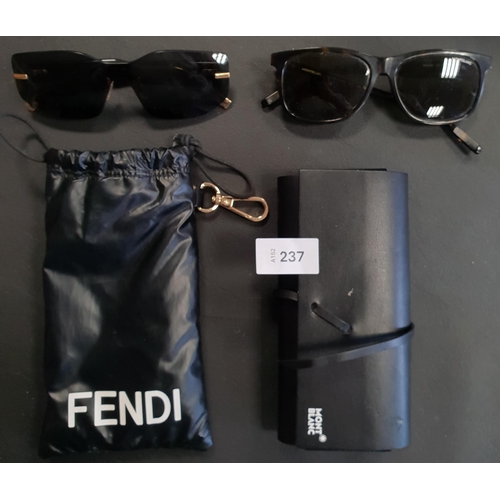 237 - TWO PAIRS OF DESIGNER SUNGLASSES
comprising Fendi in pouch; and Mont Blanc in case
Note: one arm of ... 