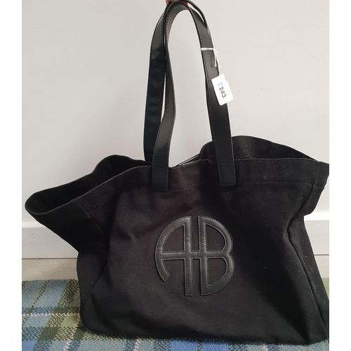 243 - ANINE BING BLACK COTTON BAG
with leather handles and monogram detail