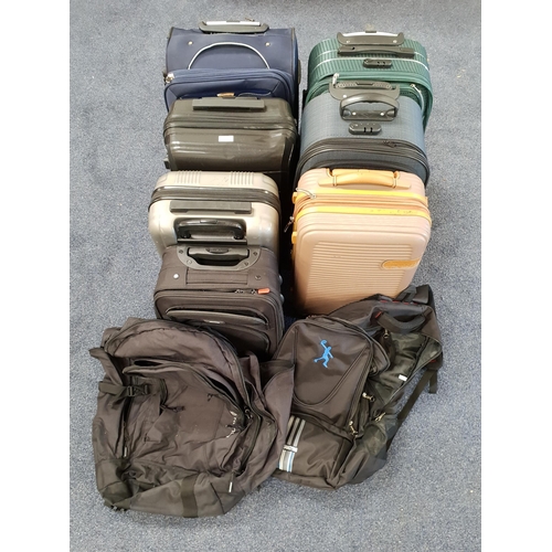 SELECTION OF SEVEN SUITCASES AND TWO RUCKSACKS 
including Linea, Hagor, IT Luggage, Swiss Polo, MSR Polo, etc.
Note: Suitcases and bags are empty