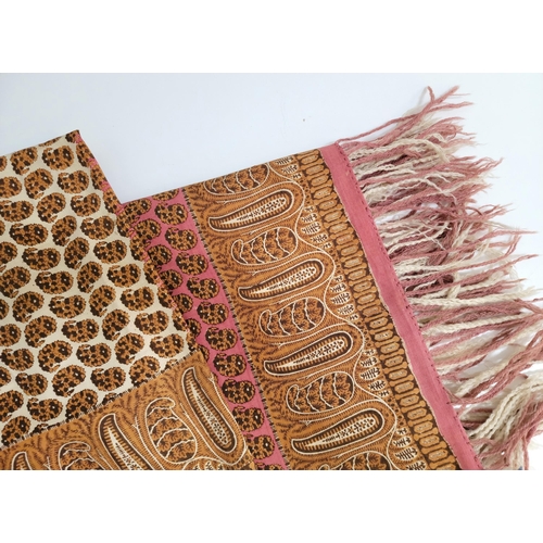 515 - VINTAGE PAISLEY SHAWL
one half pink and brown the other cream and brown, with fringing, 307 x 140cm