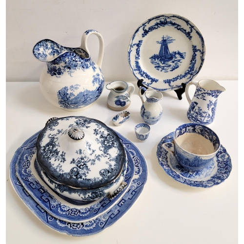 279 - ASSORTMENT OF BLUE AND WHITE CERAMICS
including large transfer printed jug, four Delft style plates ... 