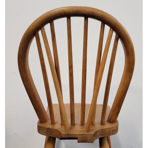 609 - FOUR OAK STICK BACK WINDSOR CHAIRS
early 20th century, with turned legs and stretchers, 42 x 85 x 45... 