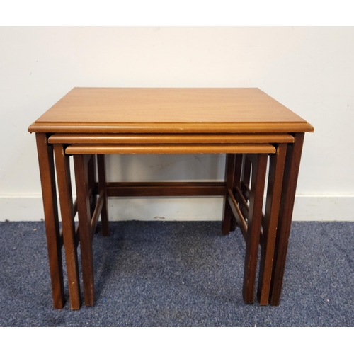 615 - NEST OF THREE MID CENTURY TEAK OCCASIONAL TABLES
the largest measuring 55 x 46 x 40cm