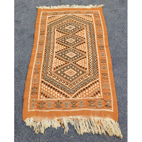 642 - HAND WOVEN MIDDLE EASTERN STYLE PRAYER RUG
in brown and cream ground with fringing, 66 x 110cm