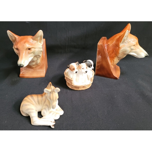 295 - SMALL SELECTION OF DECORATIVE CERAMICS comprising a pair of fox head bookends, Royal Doulton Terrier... 