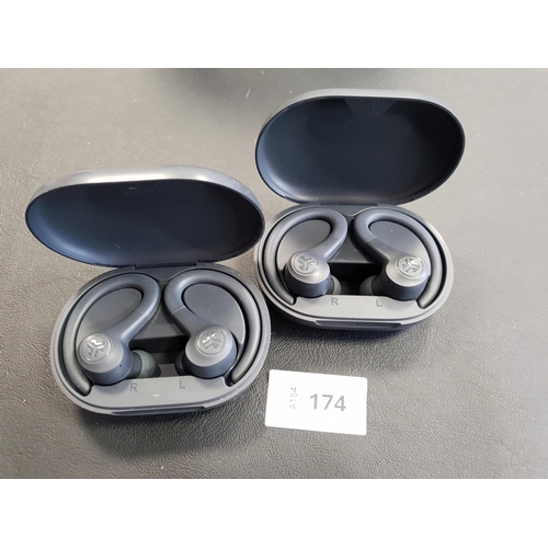 174 - TWO PAIRS OF JLAB EARBUDS IN CHARGING CASES