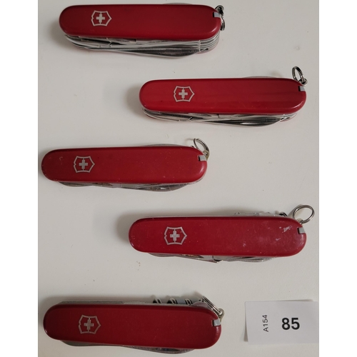 85 - FIVE VICTORINOX SWISS ARMY KNIVES
of various sizes and designs
Note: You must be over the age of 18 ... 