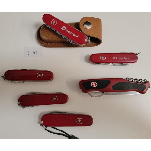 87 - SIX VICTORINOX SWISS ARMY KNIVES 
of various sizes and designs
Note: You must be over the age of 18 ... 