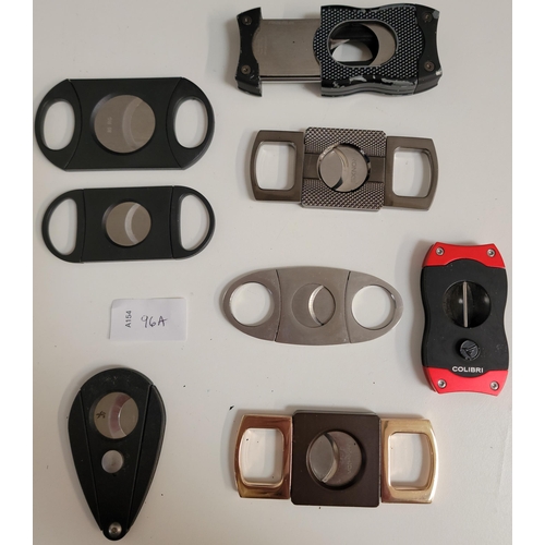 96A - EIGHT CIGAR CUTTERS
of various sizes and designs
Note: You must be over the age of 18 to bid on this... 