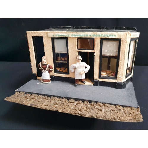 412 - VINTAGE DIORAMA OF T TUNNOCK 'THEN AND NOW'
the interior with figures, model cakes and treats, 25.5 ... 