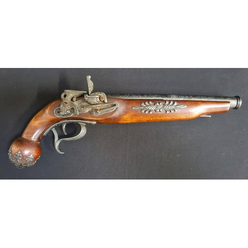 414 - REPLICA FLINTLOCK PISTOL
with ornate detail to metal work, 40cm long