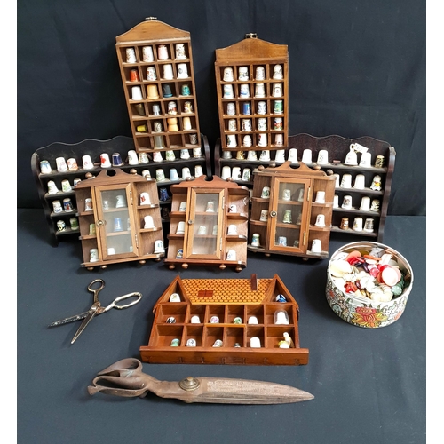 415 - ASSORTMENT OF THIMBLES, HABERDASHERY SCISSORS AND BUTTONS
including pin cushion in the form of a sil... 