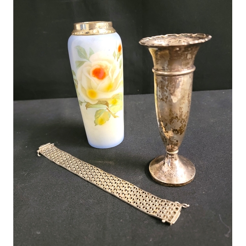 256 - SMALL SELECTION OF SILVER ITEMS
comprising a mesh bracelet, 37.3 grams; a weighted silver bud vase, ... 