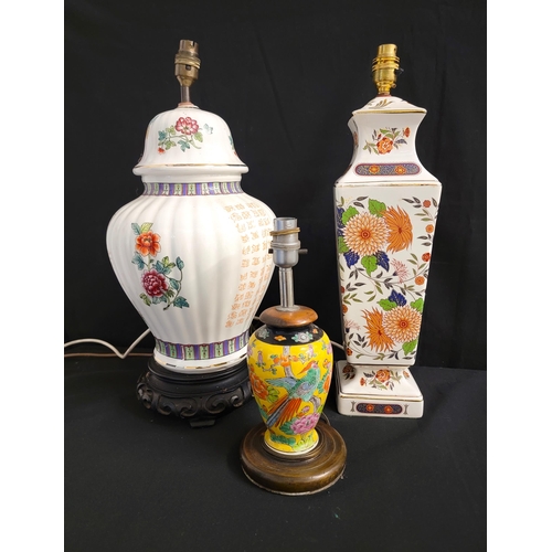 317 - SELECTION OF THREE EAST ASIAN STYLE CERAMIC LAMPS
comprising one with floral motifs on white ground,... 