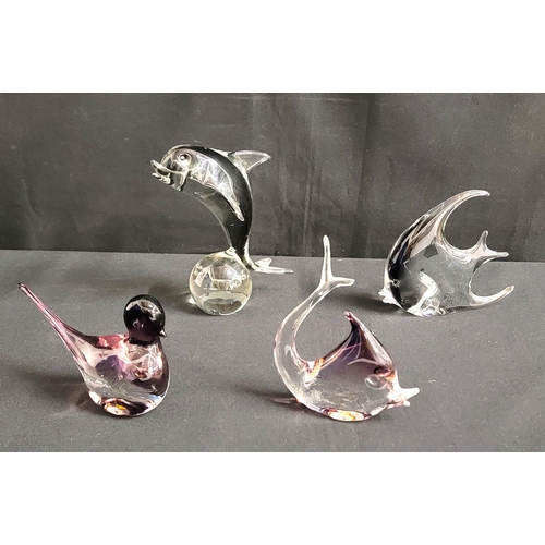 319 - FOUR STUDIO GLASS ANIMALS
including bird with Murano label to base, two fish and a dolphin, the larg... 