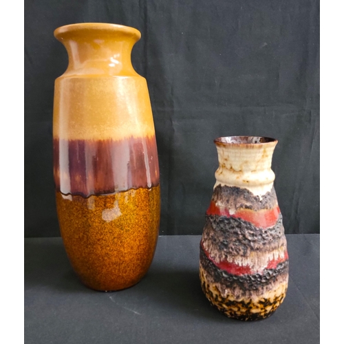 320 - TWO BAY KERAMIK WEST GERMAN VASES 
comprising fat lava vase, coloured red, brown and beige, numbered... 