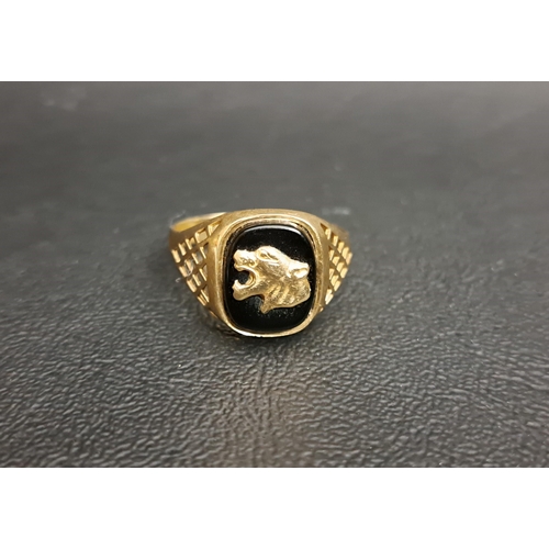 36 - AGATE SET NINE CARAT GOLD SIGNET RING
the black agate panel decorated with a leopard's head, on nine... 