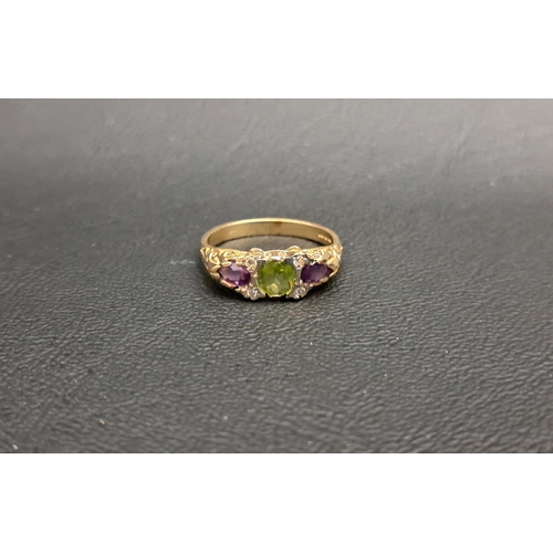 87 - PERIDOT, AMETHYST AND DIAMOND RING
the central round cut peridot approximately 0.45cts flanked by pe... 