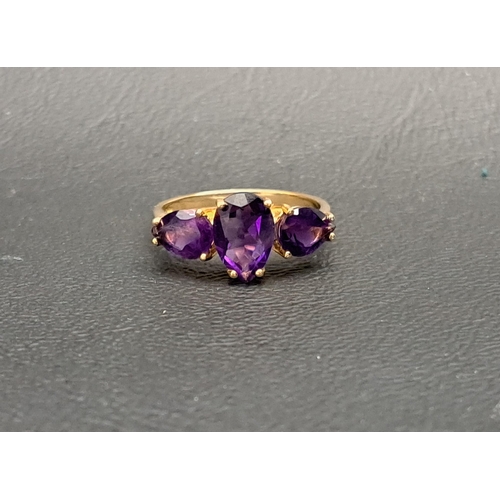 103 - AMETHYST THREE STONE RING
the central pear cut amethyst approximately 1ct flanked by a smaller pear ... 