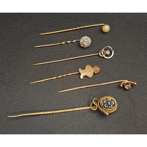 178 - SELECTION OF FOUR GOLD STICK PINS
comprising a Victorian mourning example set with small diamond and... 