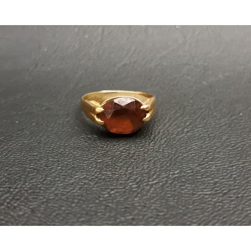 200 - GARNET SINGLE STONE RING
the oval cut garnet approximately 2cts, on nine carat gold shank, ring size... 