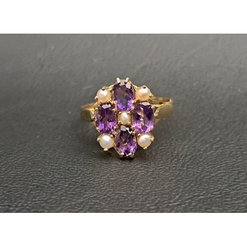 AMETHYST AND SEED PEARL CLUSTER RING
the four oval cut amethysts interspersed with seed pearls, on nine carat gold shank, ring size O