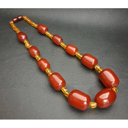 34 - AMBER BEAD NECKLACE
the larger graduated cherry amber beads separated by small faceted yellow glass ... 