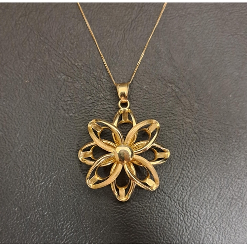 55 - NINE CARAT GOLD FLOWER PENDANT ON CHAIN
the pierced flower head pendant on fine nine carat gold chai... 