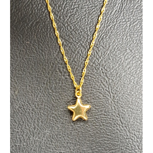 88 - NINE CARAT GOLD ROPE TWIST NECK CHAIN
with star pendant and moveable clasp attachment allowing the w... 