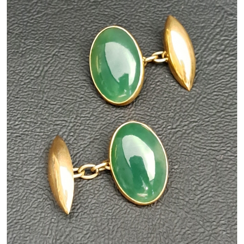 92 - PAIR OF JADE SET CUFFLINKS
in fourteen carat gold