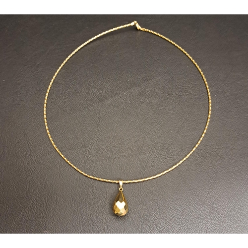 97 - NINE CARAT GOLD PENDANT ON CHAIN
the faceted teardrop shaped pendant on torque style chain, total we... 