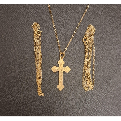 112 - THREE NINE CARAT GOLD NECK CHAINS
one with nine carat gold cross pendant, total weight approximately... 