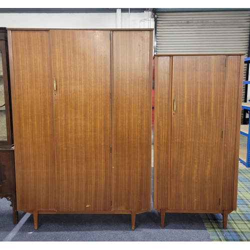 685 - TWO LEBUS MID CENTURY WARDROBES
the largest wardrobe with two rails and raised on tapered legs, 123 ... 