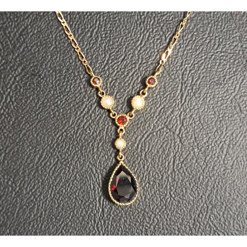 28 - GARNET AND SEED PEARL NECKLACE
the pear cut garnet approximately 1.3cts below small garnets and seed... 