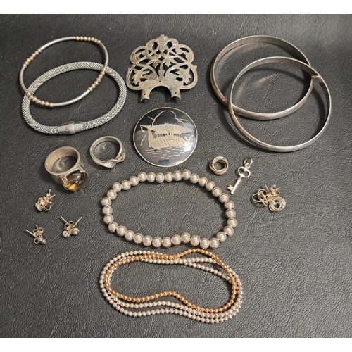 41 - SELECTION OF SILVER JEWELLERY
including five unmarked silver bead bracelets, two bangles, a cabochon... 