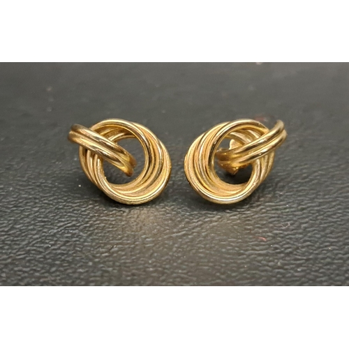 83 - PAIR OF NINE CARAT GOLD EARRINGS
of entwined form, total weight approximately 1.2 grams