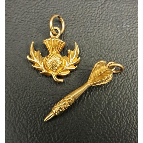 146 - TWO NNE CARAT GOLD CHARMS
one in the form of a thistle and the other a dart, total weight approximat... 