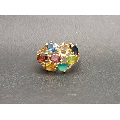 4 - MULTI GEM STONE RING
on nine carat gold shank with pierced setting and textured detail, the gemstone... 