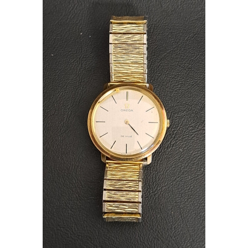 58 - GENTLEMEN'S 1970s OMEGA DE VILLE NINE CARAT GOLD CASED WRISTWATCH
the champagne dial with baton five... 