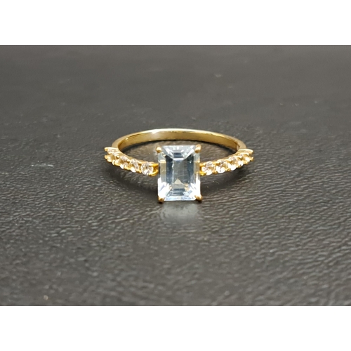 68 - AQUAMARINE AND CLEAR GEM SET RING
the central emerald cut gemstone approximately 1.2cts flanked by c... 