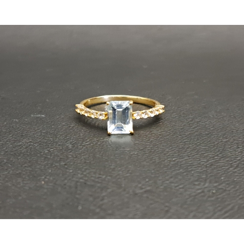 68 - AQUAMARINE AND CLEAR GEM SET RING
the central emerald cut gemstone approximately 1.2cts flanked by c... 