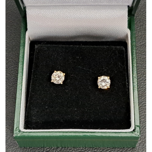 138 - PAIR OF DIAMOND STUD EARRINGS
the round brilliant cut diamond on each approximately 0.45cts each (0.... 