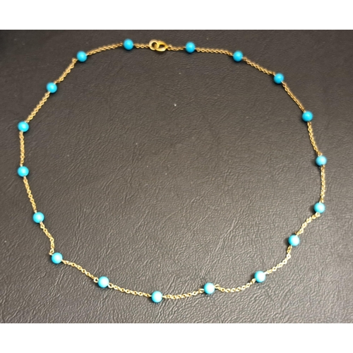 145 - TURQUOISE SET NINE CARAT GOLD NECK CHAIN
approximately 42cm long and 3.2 grams