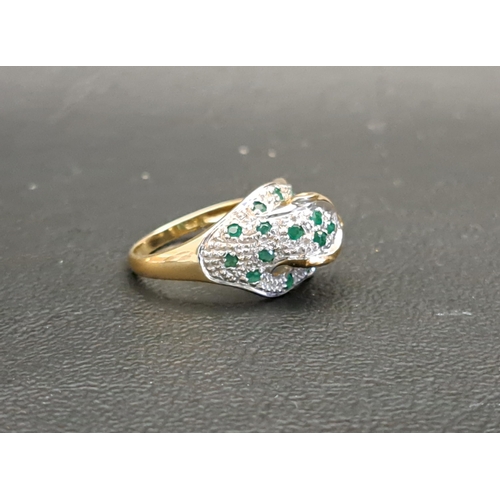 35 - DIAMOND AND EMERALD SET CARTIER STYLE PANTHER RING
the panther with pave set diamond and emeralds, i... 