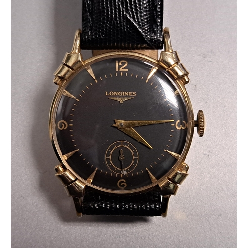 132 - GENTLEMAN'S LONGINES FOURTEEN CARAT GOLD CASED WRISTWATCH
circa 1950, the black dial with Arabic num... 